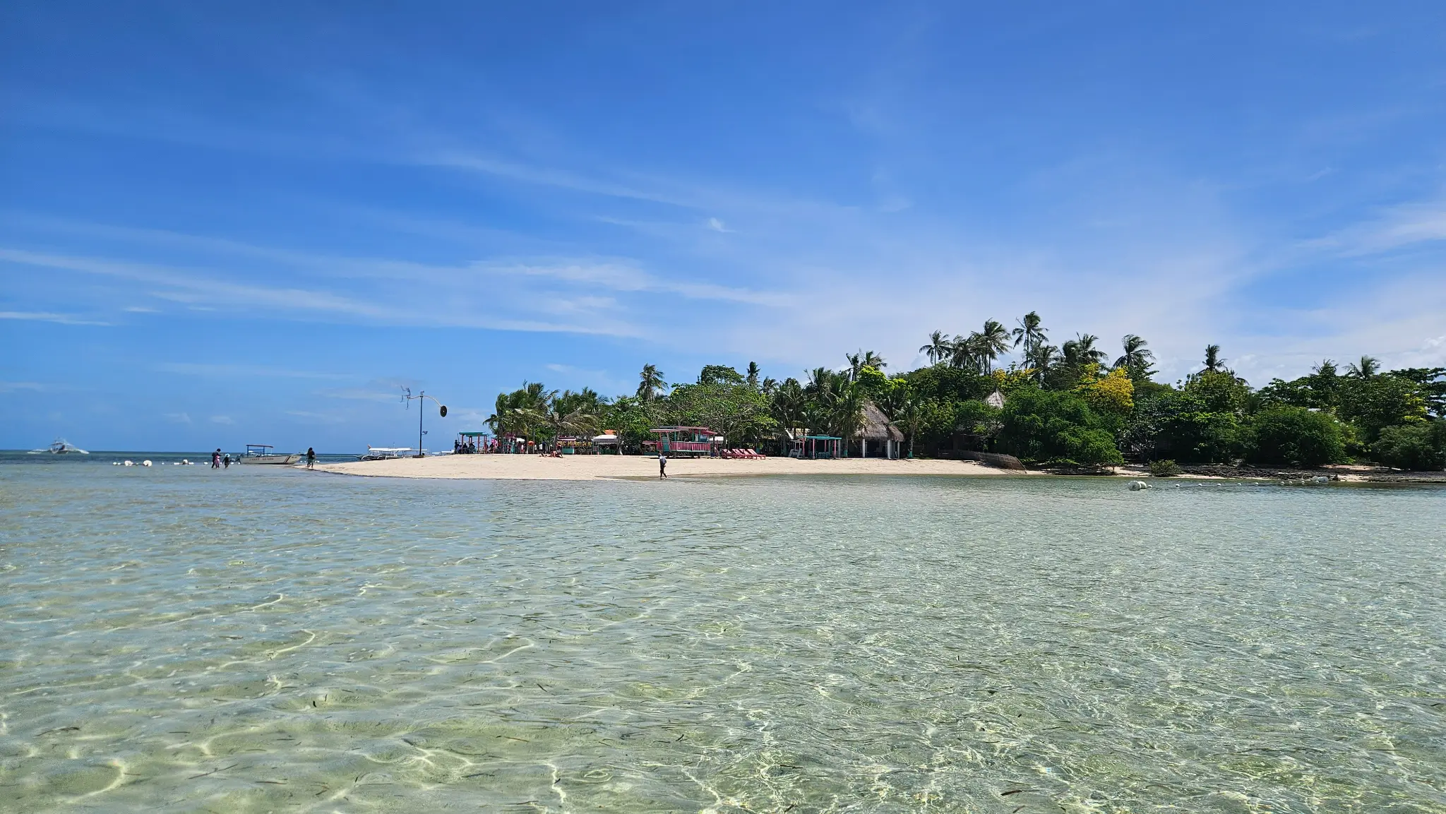 Caohagan Island with white sand beach and crystal clear shallow water, Mactan Island Cebu Philippines